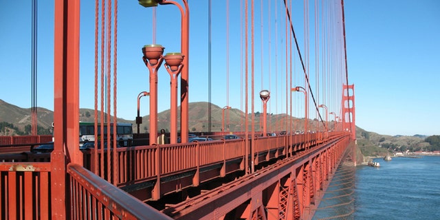 This undated artist rendering provided by the Golden Gate Bridge authorities shows the proposed netting suicide barrier that is to be installed under the iconic bridge in San Francisco.