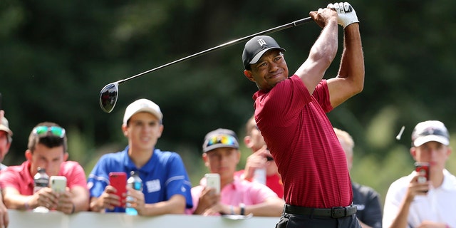 Tiger Woods remains hospitalized after suffering multiple leg injuries in a SUV rollover crash on Tuesday.