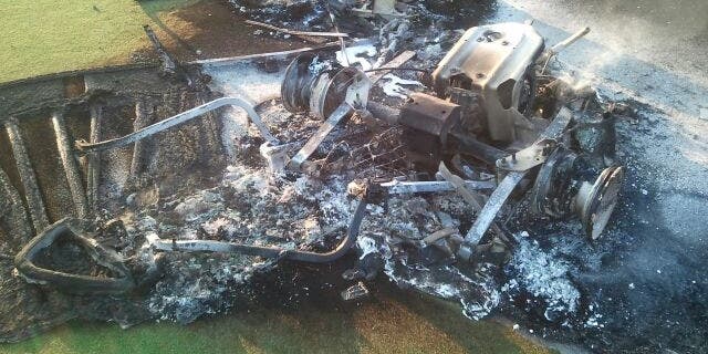 This undated photo shows a damaged golf cart.