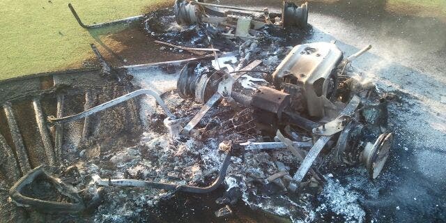 This undated photo shows a damaged golf cart.
