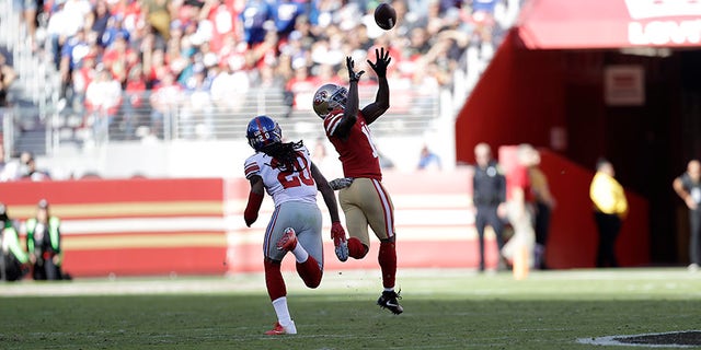 Nov. 12, 2017: San Francisco 49ers wide receiver Marquise Goodwin catches a touchdown pass in front of New York Giants cornerback Janoris Jenkins during the first half of a game in Santa Clara, Calif.,
