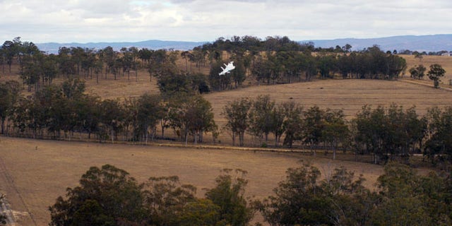 This undated image provided by Google shows a Project Wing drone vehicle during delivery.