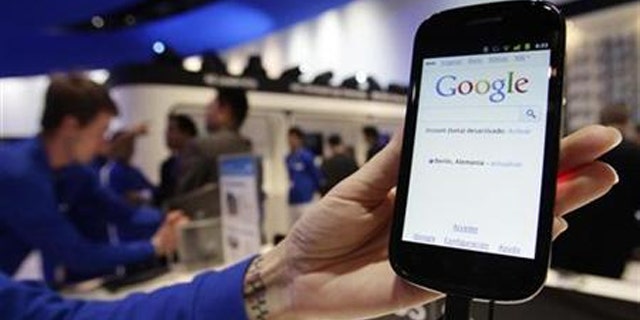 Samsung's Nexus S mobile phone, the first smartphone to use the Android 2.3 ''Gingerbread'' operating system, is displayed at the GSMA Mobile World Congress in Barcelona February 15, 2011.
