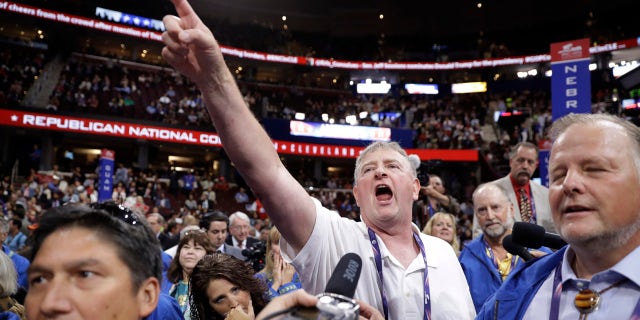 July 19, 2016: Alaska former state Sen. Dave Donley reacts to Alaska's recount during the second day session of the Republican National Convention in Cleveland
