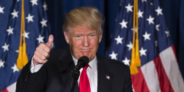 FILE -- April 27, 2016: Republican presidential candidate Donald Trump gives a thumbs up after giving a foreign policy speech at the Mayflower Hotel in Washington. (AP Photo/Evan Vucci)