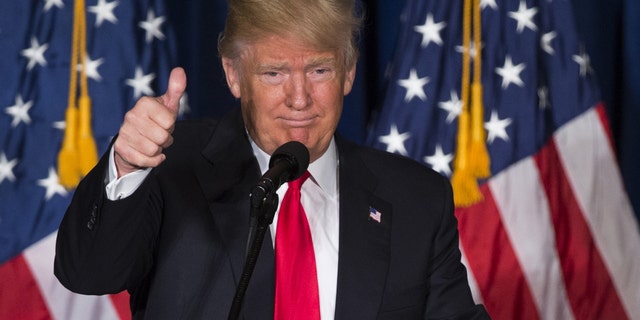 FILE -- April 27, 2016: Republican presidential candidate Donald Trump gives a thumbs up after giving a foreign policy speech at the Mayflower Hotel in Washington. (AP Photo/Evan Vucci)
