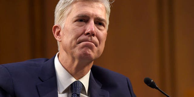 Supreme Court Justice nominee Neil Gorsuch listens as he is asked a question by Sen. Mazie Hirono, D-Hawaii, on Capitol Hill in Washington, Wednesday, March 22, 2017, during his confirmation hearing before the Senate Judiciary Committee. (AP Photo/Susan Walsh)
