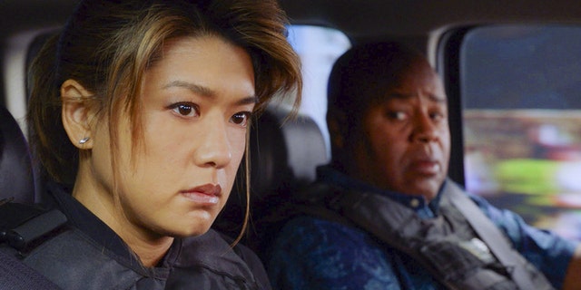 Pictured left to right: Grace Park as Kono Kalakaua and Chi McBride as Lou Grover in CBS' "Hawaii 5-0."