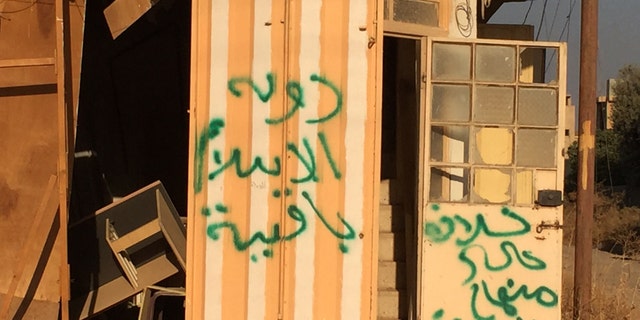 Scrawled terror message-“I.S. will stay forever”