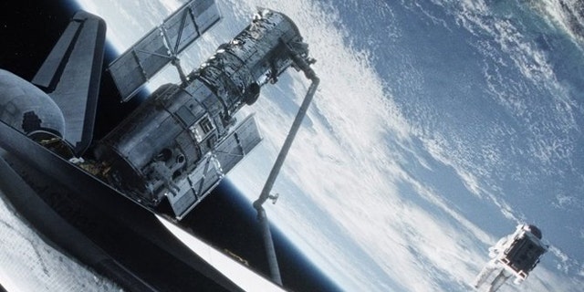 Director Alfonso Cuarón's visually stunning film "Gravity," in theaters today, is already being heralded as one of the year's best movies. Sandra Bullock and George Clooney star as astronauts whose mission goes spectacularly wrong when a cloud of orbital debris shreds their shuttle, cuts off communication and leaves them stranded in space.