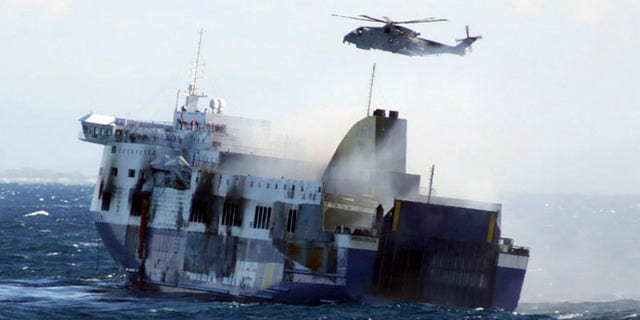 Dec. 29, 2014: In this image released by the Italian Navy, smoke billows from the Italian-flagged Norman Atlantic that caught fire in the Adriatic Sea.