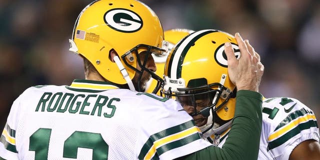PHILADELPHIA, PA - NOVEMBER 28: Aaron Rodgers #12 and Davante Adams #17 of the Green Bay Packers celebrate after a touchdown in the first quarter against the Philadelphia Eagles at Lincoln Financial Field on November 28, 2016 in Philadelphia, Pennsylvania. (Photo by Elsa/Getty Images)