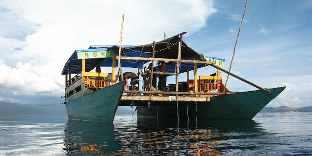 Locals built the sampling boat researchers used to test the waters of Lake Matano for the rare iron mineral known as green rust.