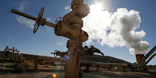 Steam rises during a test from a well at the Coso geothermal field at the China Lake Naval Air Weapons Station in China Lake, California in this July 31, 2008 file photo. California set detailed goals to cut greenhouse gases and address global warming on December 11, 2008 in the face of strong criticism that an economic analysis buttressing the plan was hopelessly optimistic. REUTERS/Fred Prouser/Files (UNITED STATES)
