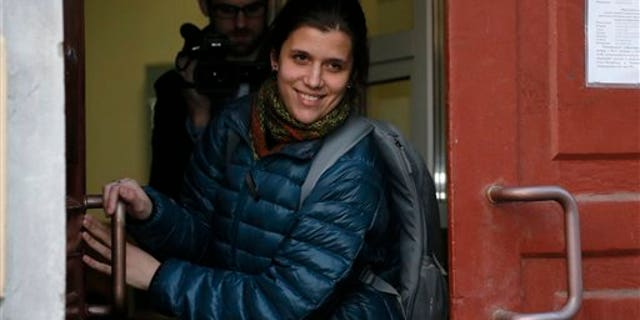 Camila Speziale exits the Federal Migration Service in St. Petersburg, Russia, on Dec. 25, 2013.