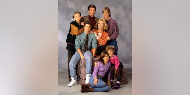 Leonardo DiCaprio, Alan Thicke and Jeremy Miller, with Kirk Cameron, seated center left, and Joanna Kerns, seated center right, and Tracey Gold, seated left on floor with Ashley Johnson of "Growing Pains." 