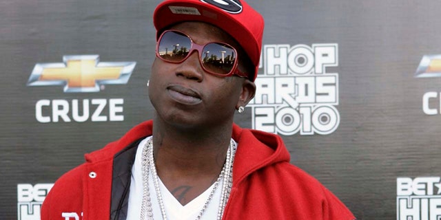 Oct. 2, 2010: In this file photo, rapper Gucci Mane arrives on the red carpet for the BET Hip Hop Awards in Atlanta.
