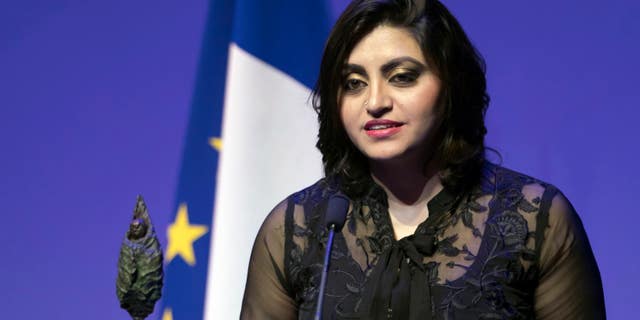 Pakistan's Gulalai Ismail delivers an acceptance speech after being awarded the Prize for Conflict Prevention for the work of her organization 'Aware Girls' promoting women's issues and equality in Pakistan at the Musee Branly in Paris, France, November 24, 2016.