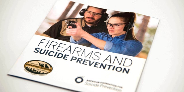 A brochure is on display that is part of an initiative involving the National Shooting Sports Foundation and the American Foundation to Prevent Suicide, Tuesday, Jan. 17, 2017, in Las Vegas. The brochures are supplied to gun dealers and gun ranges to help gun owners understand the warning signs of those at risk of suicide and to find ways to prevent suicide. Itâs a difficult topic to discuss and an even tougher one to fix, fraught with politics and societal stigmas: people who kill themselves with a gun. But now two unlikely allies, the gun industry and a leading suicide prevention group, are coming together to tackle it. (AP Photo/Lisa Marie Pane)