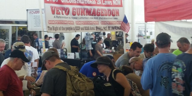 The group dubbed "Veto Gunmageddon" made its presence known at a gun show in Costa Mesa, Calif., and at others around the state.
