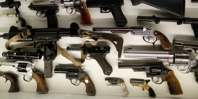 Different kinds of arms are seen on display at the 'Top Secret' Spy Museum in Oberhausen, July 10, 2013.