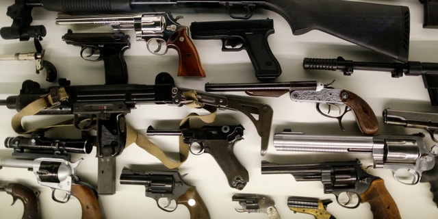 Different kinds of arms are seen on display at the 'Top Secret' Spy Museum in Oberhausen, July 10, 2013.