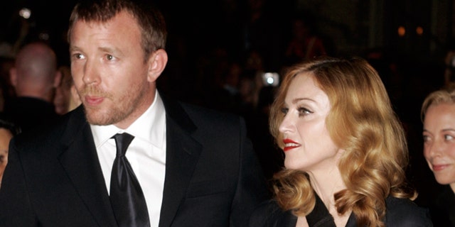 September 11, 2005. Madonna (R) arrives with her husband, director Guy Ritchie, for the world premiere of Ritchie's film "Revolver" in Toronto.