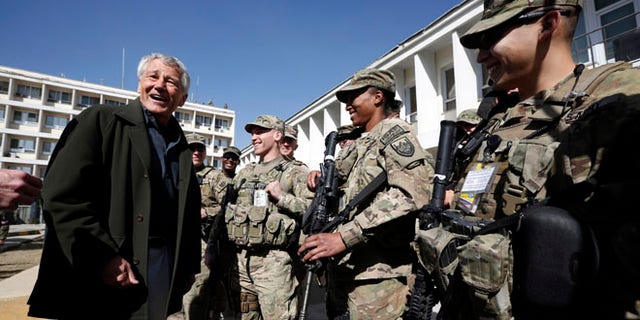 March 10, 2013: U.S. Defense Secretary Chuck Hagel, left, meets with U.S. Army troops during his visit to the Kabul Military Training Center in Kabul, Afghanistan. Hagel said he believes U.S. officials will be able to work things out with Afghan leaders who have ordered special operations forces out of Wardak province, even as commandos face a Monday deadline to leave.