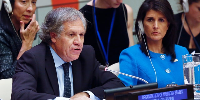 United Nations U.S. Ambassador Nikki Haley, right, listens as Organization of American States Secretary General Luis Almargo speaks during a U.N. meeting on human rights concerns in Venezuela, Monday Nov. 13, 2017 at U.N. headquarters.