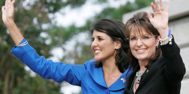 Former Alaska Gov. Sarah Palin waves as she endorses S.C. gubernatorial candidate Nikki Haley May 14 in Columbia, S.C. (AP Photo)