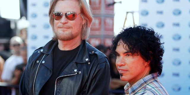Musicians Daryl Hall and John Oates, right, arrive for the 9th season finale of "American Idol" in Los Angeles May 26, 2010.