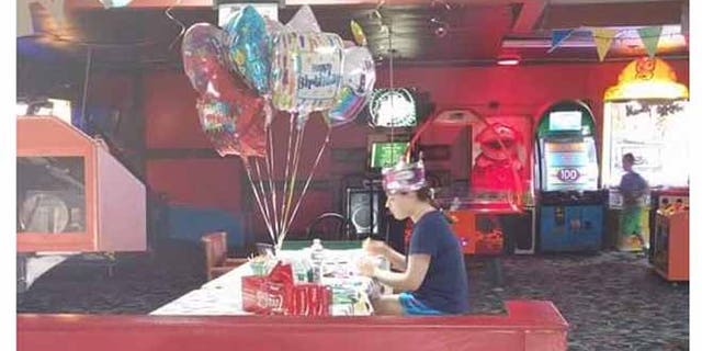 Photo of Hallee Sorenson celebrating her 18th birthday alone has gone viral. (Rebecca Guildford)