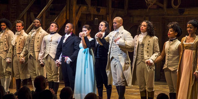 August 6, 2015: Lin-Manuel Miranda (5th right), actor and creator of the of the play 'Hamilton' bows to the audience after opening night of the play on Broadway in New York.