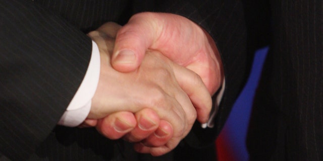 BERLIN - JANUARY 22: Foreign Minister Frank-Walter Steinmeier (R) and Chinese Foreign Minister Yang Jiechi shake hands after speaking to the media after bilateral talks on January 22, 2008 in Berlin, Germany. The two men met ahead of a meeting of the foreign ministers of Germany, China, the USA, Russia, Britain and France to discuss the Iranian nuclear program. Germany and China slid into chilly relations after Chancellor Merkel received the Dalai Lama last year in the Chancellery, though in recent weeks China has made announcements that have thawed the two countries' relationship. (Photo by Sean Gallup/Getty Images)