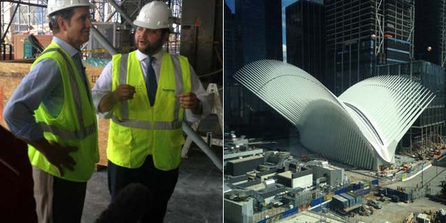 Scott, at left talking with a construction official, investigates the rebuilding of Ground Zero.
