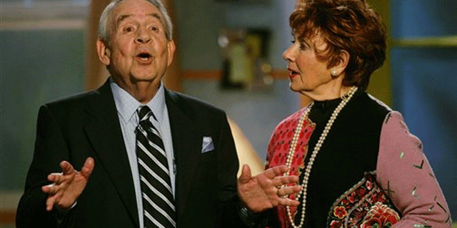 Dec 1. 2004: Tom Bosley, left, and Marion Ross, who played parents on the television show "Happy Days," speak to attendees of the sixth annual Family Television Awards in Beverly Hills, Calif. The wife of the late Tom Bosley and a few other actors claim they're owed millions in merchandise rights. An attorney for the cast members says after filing a $10 million lawsuit earlier this year, the actors received checks for merchandise in the amount of roughly $6,000.