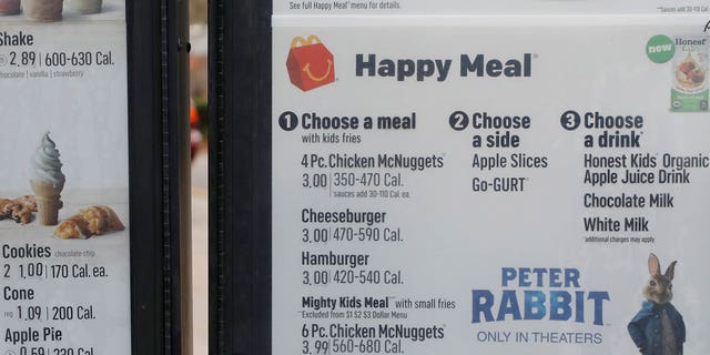 In addition to cheeseburgers, McDonald's will also temporarily remove chocolate milk from Happy Meal menu offerings — but customers can still get both if they ask.