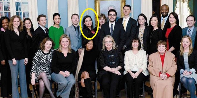 Monica Hanley, pictured standing in the back row right behind Hillary Clinton aide Cheryl Mills in a State Department photo from Clinton's book "Hard Choices."