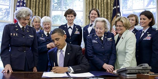 July 1, 2009: President Obama signS S.614, a bill to award a Congressional Gold Medal to the Women Airforce Service Pilots, in the Oval Office. At second left is WASP pilot Elaine Danforth Harmon. (The White House)