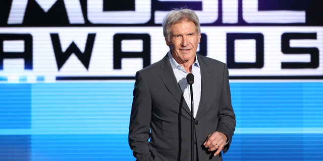 Harrison Ford introduces a performance by Pentatonix at the American Music Awards at the Microsoft Theater on Sunday, Nov. 22, 2015, in Los Angeles. (Photo by Matt Sayles/Invision/AP)