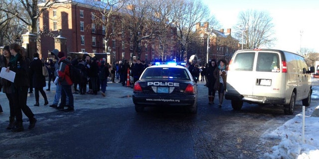 Dec. 16, 2013: Students are seen at Harvard University after being evacuated over unconfirmed reports of explosives.