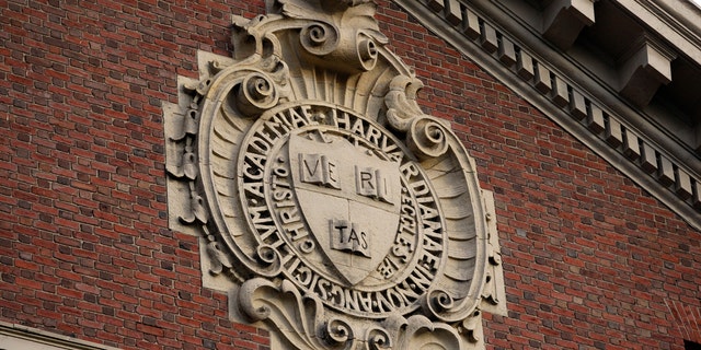 A seal hangs over a building at Harvard University in Cambridge, Massachusetts 