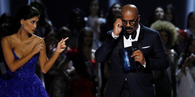 Outgoing Miss Universe Pia Wurtzbach and emcee Steve Harvey in Pasay, Philippines Jan. 30, 2017.