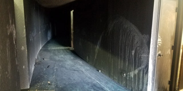 In this photo provided by KITV, fire damage from a blaze that killed three people and left 12 injured in the Marco Polo building in Honolulu is shown on Saturday, July 15, 2017.