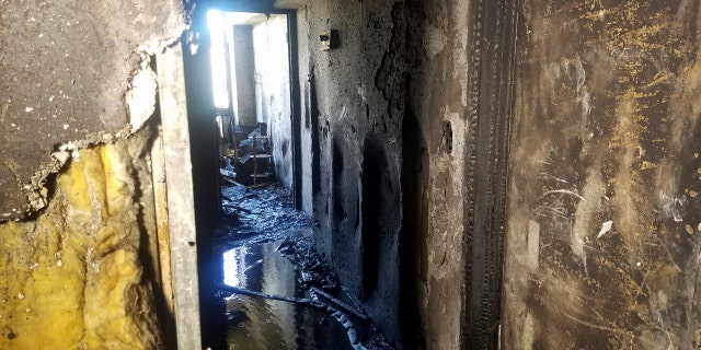 In this photo provided by KITV, fire damage from a blaze that killed three people and left 12 injured in the Marco Polo building in Honolulu is shown on Saturday, July 15, 2017.