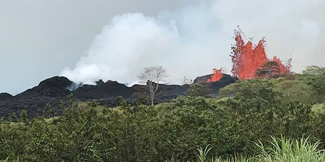 Lava erupts from Fissure 22 on Hawaii's Kilauea volcano on Monday, shooting up to 150 feet in the air.