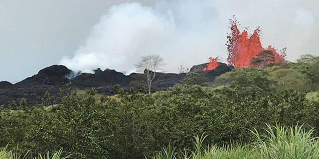 Lava erupts from Fissure 22 on Hawaii's Kilauea volcano on Monday, shooting up to 150 feet in the air.