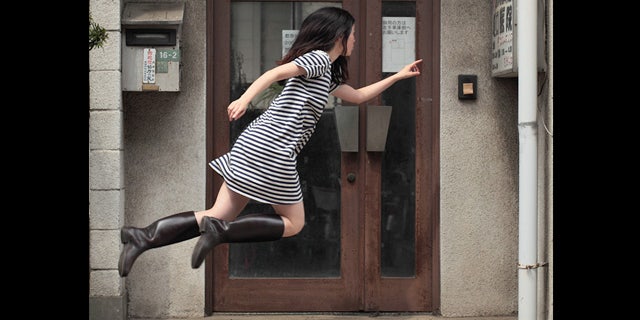Photographer Natsumi Hayashi captures herself 'levitating' outside an abandoned Tokyo clinic. These peaceful shots sometimes take 300 tries to capture.