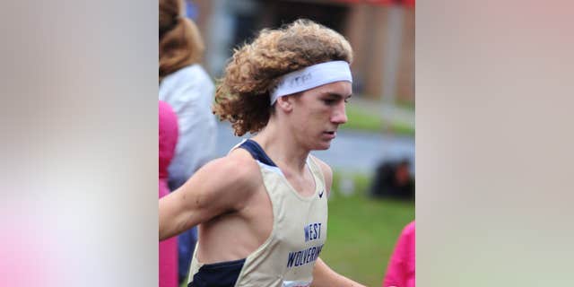 In this undated photo high school cross country runner John Green wears a headband (Courtesy Britt Smith)