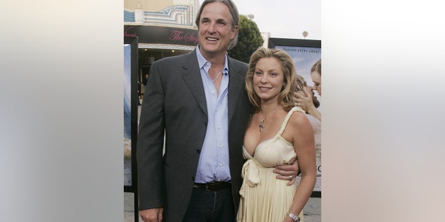 Nick Cassavetes (L), director of the new drama film "The Notebook" poses with actress Heather Wahlquist from the film, as they arrive for the film's premiere in Los Angeles, June 21, 2004.